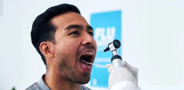 Man Receiving Oral Cancer Screening in Waco Dental Office