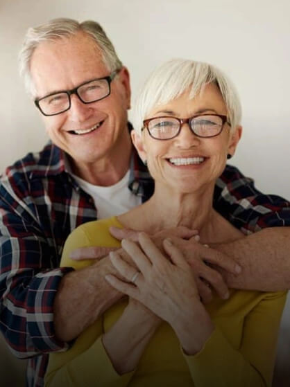 Smiling Happy Couple Showing Healthy Teeth After Restorative Dentistry Procedure in Waco